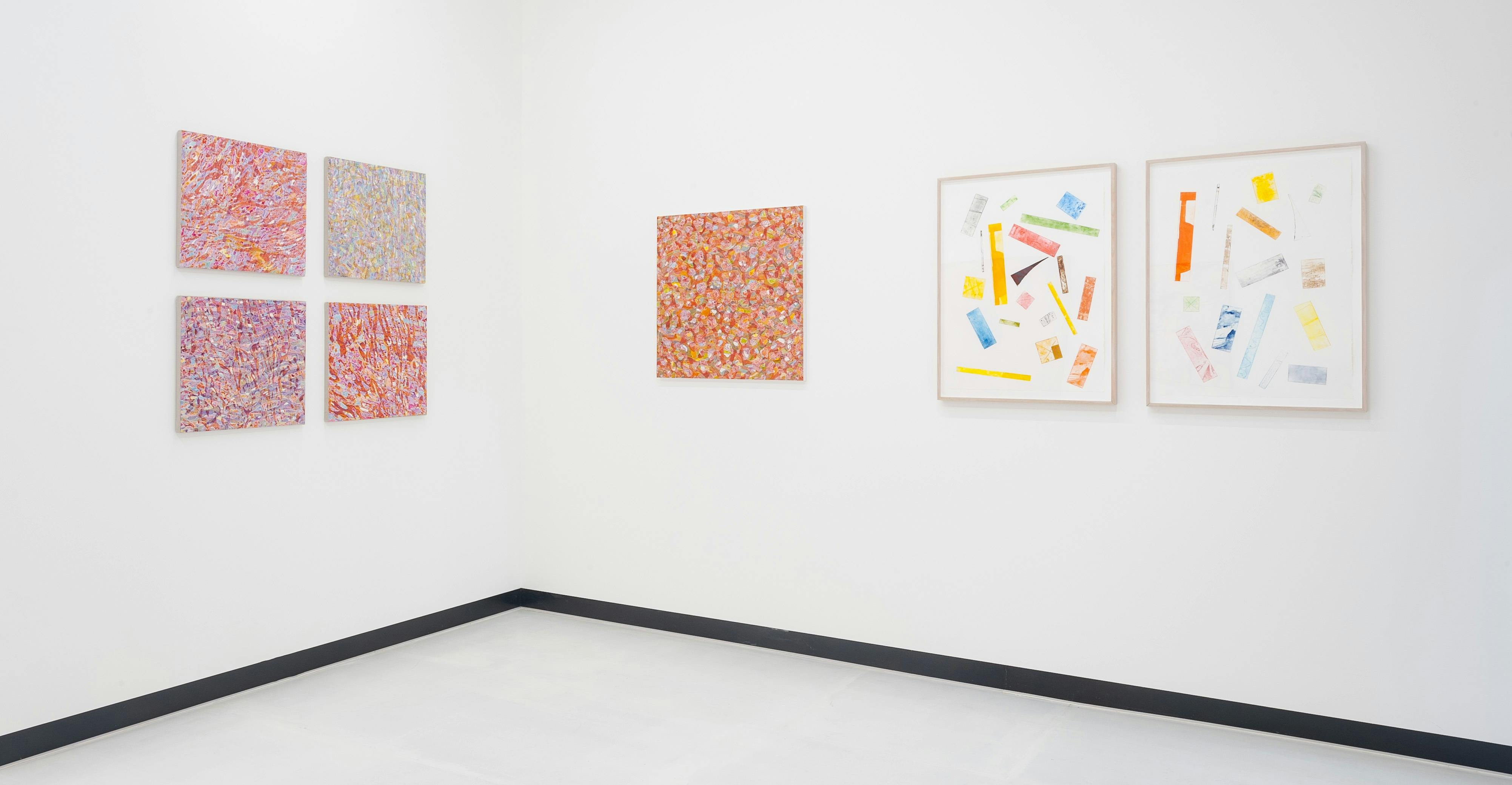 Photo of paintngs installed in gallery