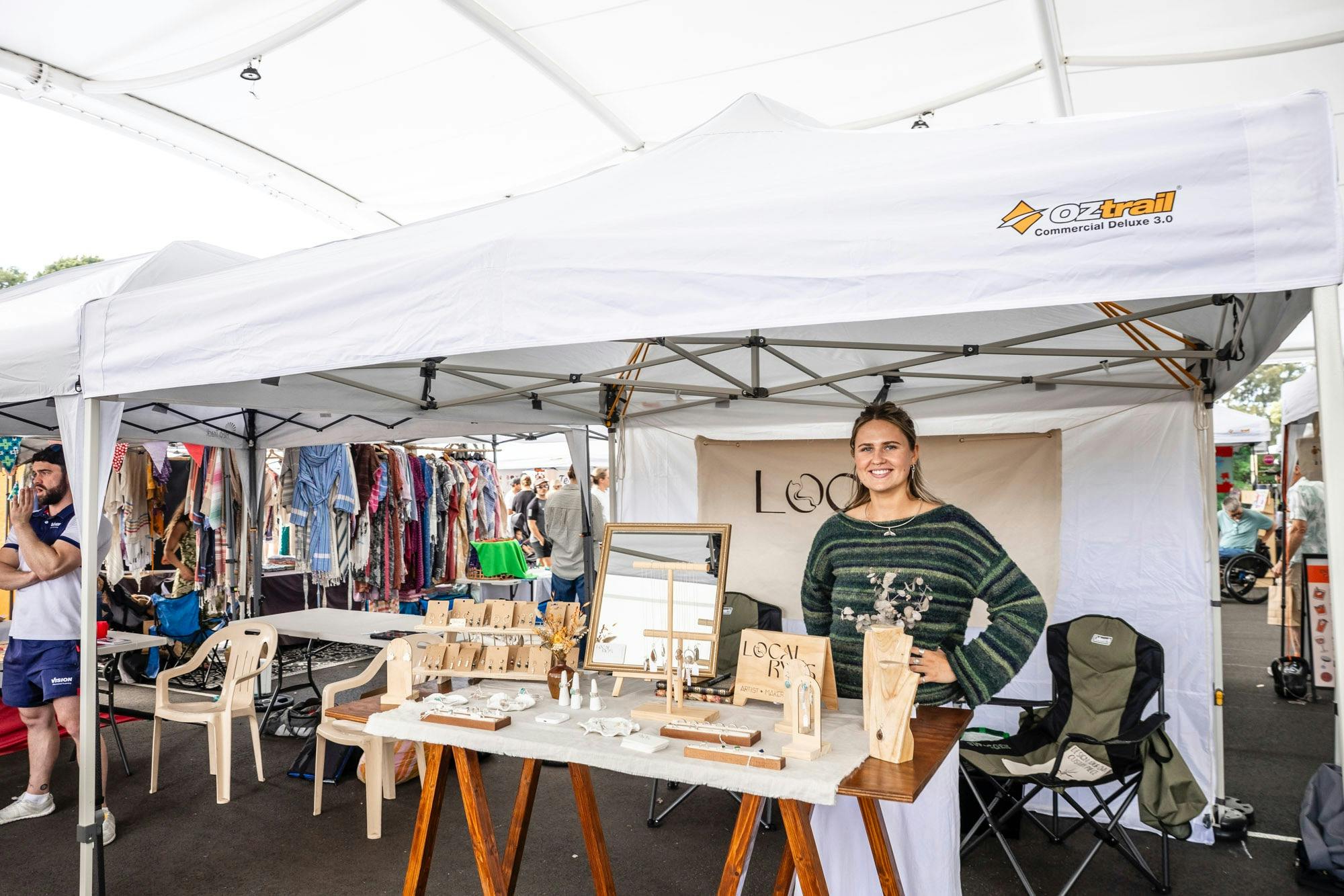Vendor selling jewellery at Heffron Park Market