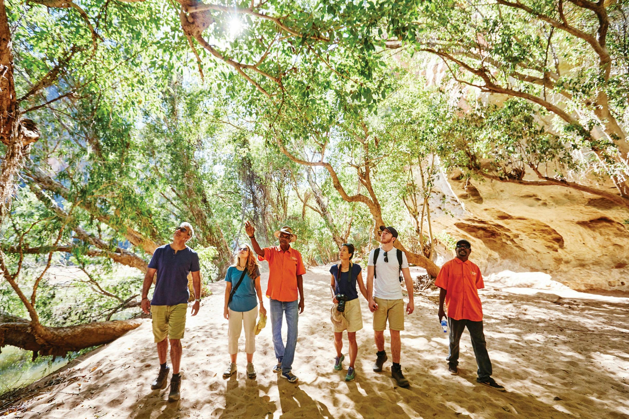 Tour group exploring Windjana Gorge with local Aboriginal tour guide.