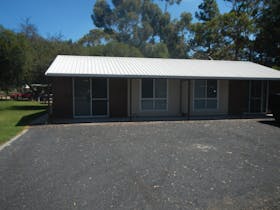 Modern brick ensuite cabin that can sleep upto 6 people, kitchen facilities, A/C & TV
