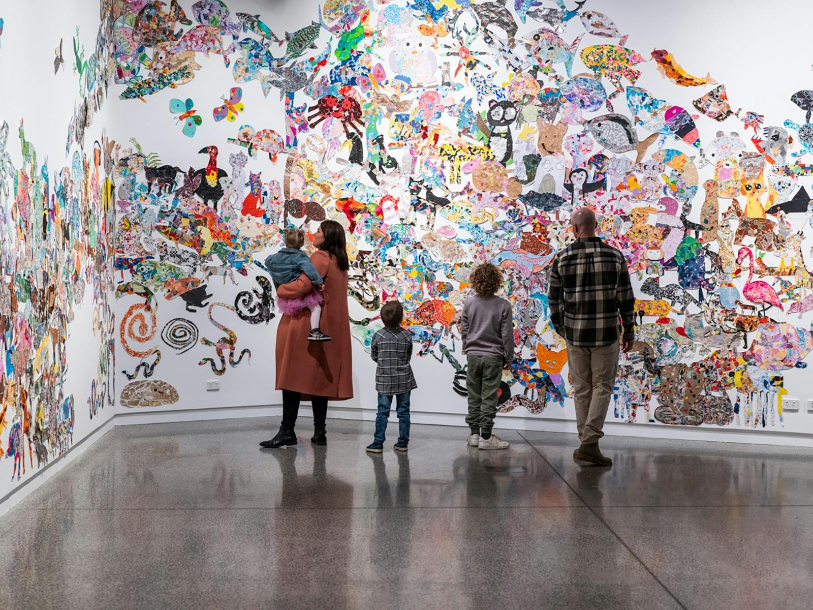 A family looks at the past exhibition 'Animal Kin'