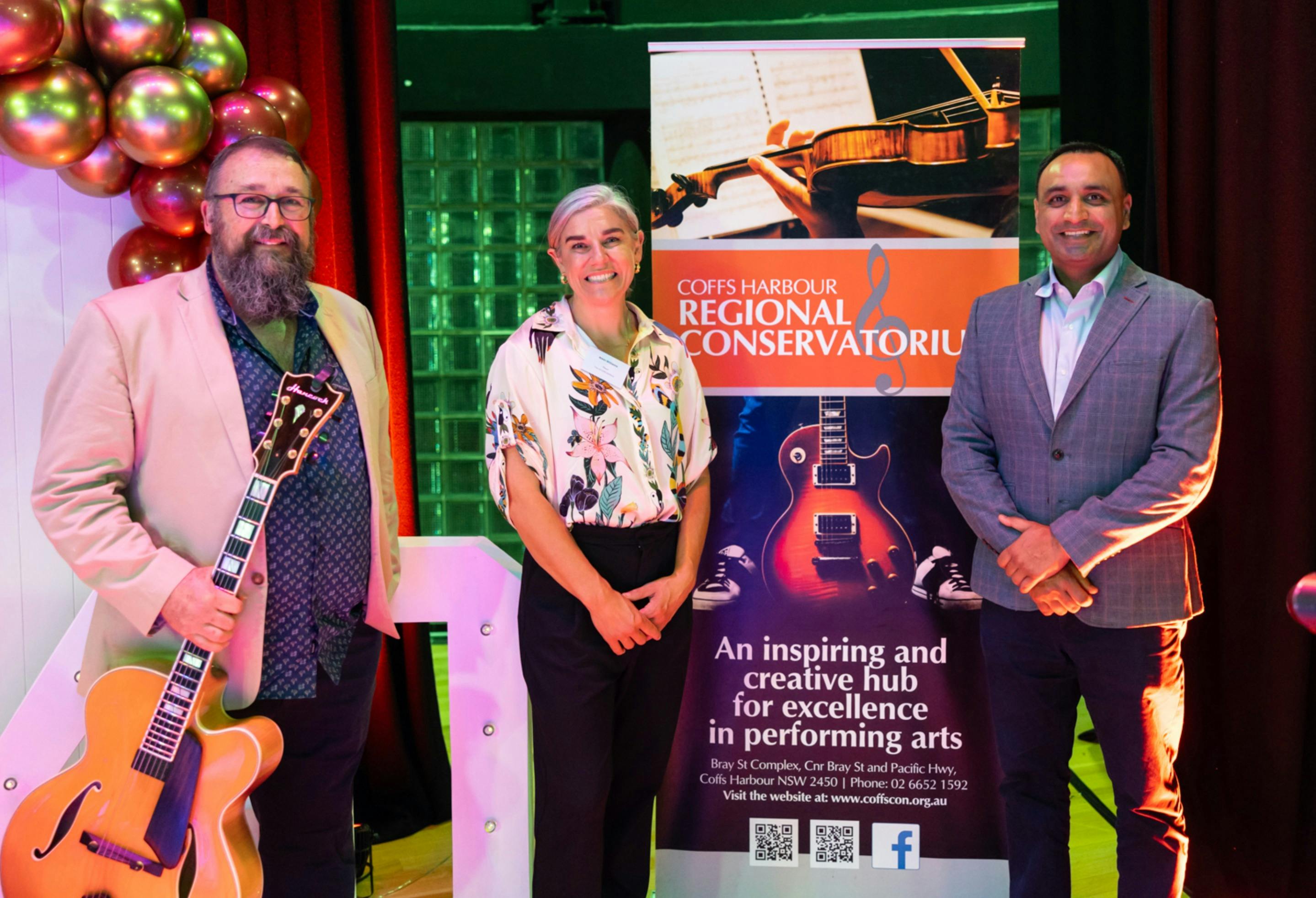 Artistic Director Dr Glen Hodges with City Coffs Harbour members