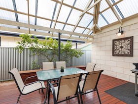 Undercover pergola with barbecue