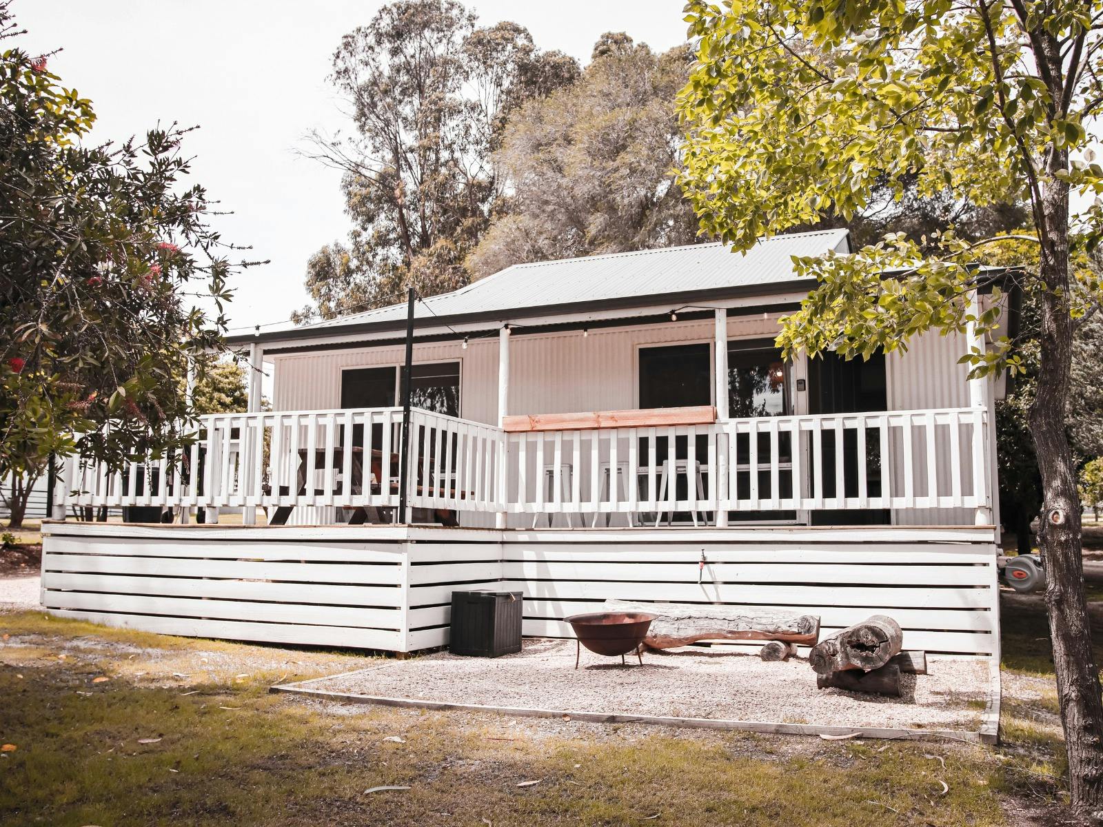 Eight Acres Farm Cottage with outdoor deck, surrounded by nature and open grassy grounds