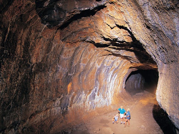 Tour group inside lava tube.