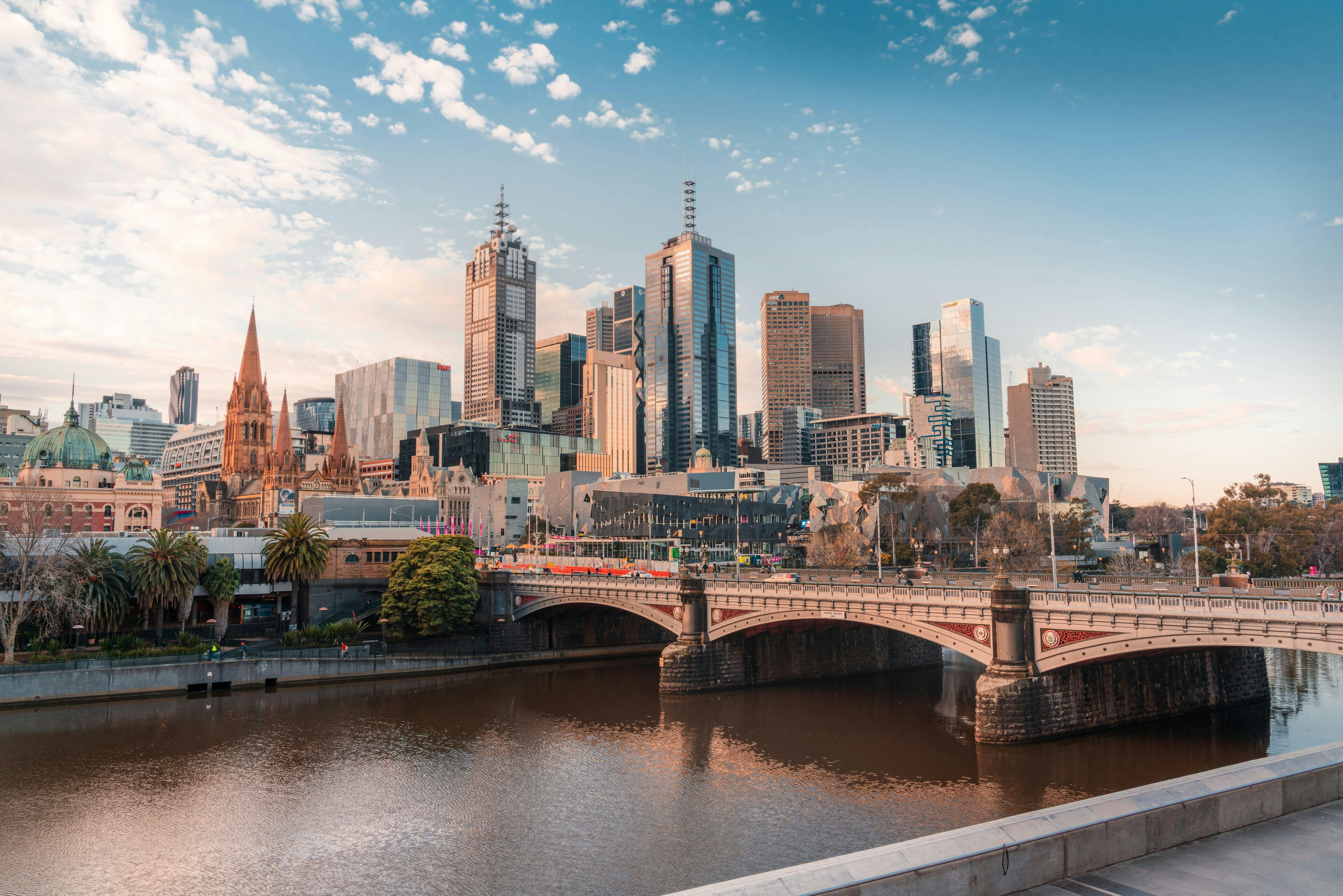Melbourne skyline with buildings in the backgrounds and the river in the foreground
