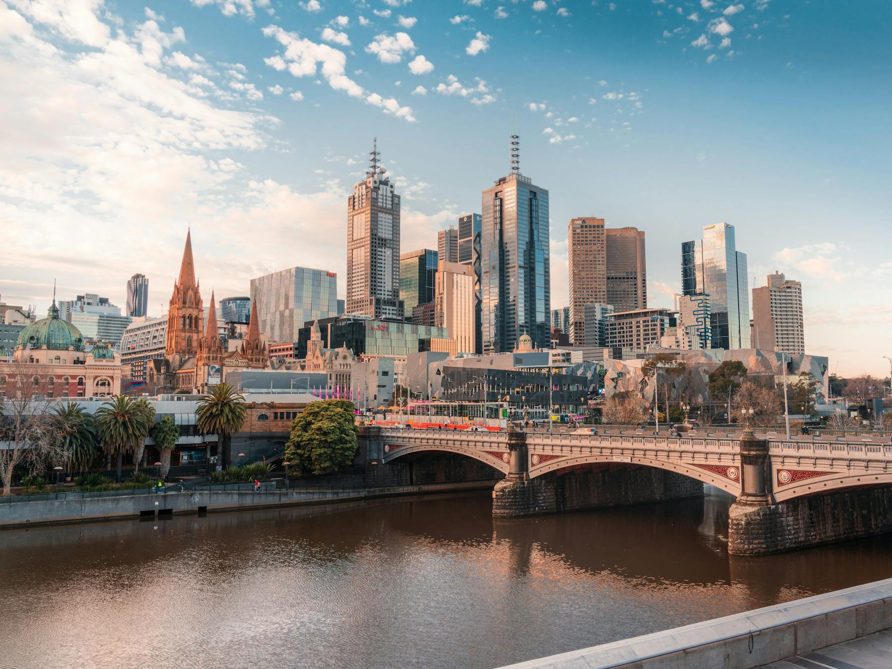 Melbourne skyline with buildings in the backgrounds and the river in the foreground