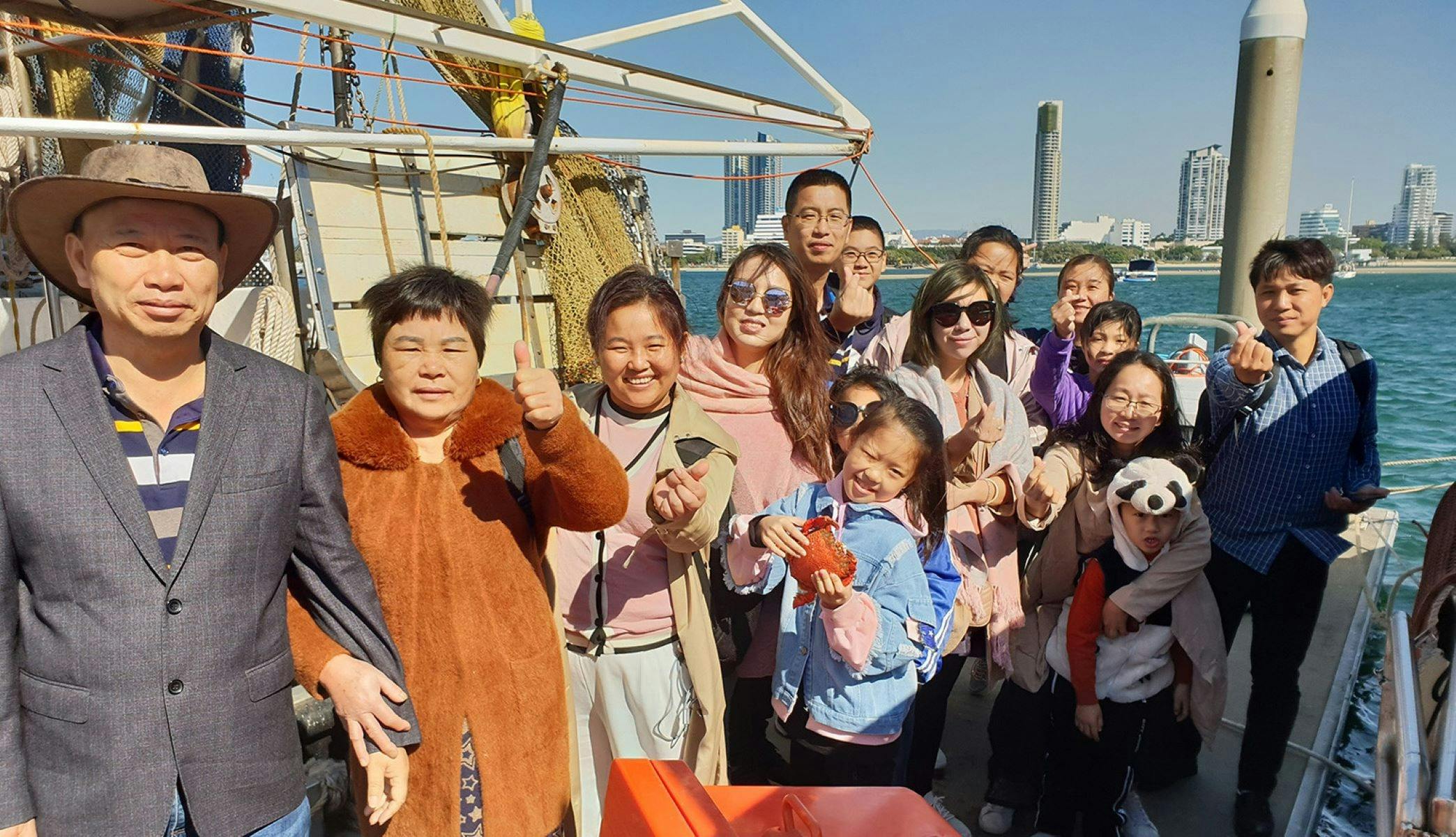 guests on boat smiling