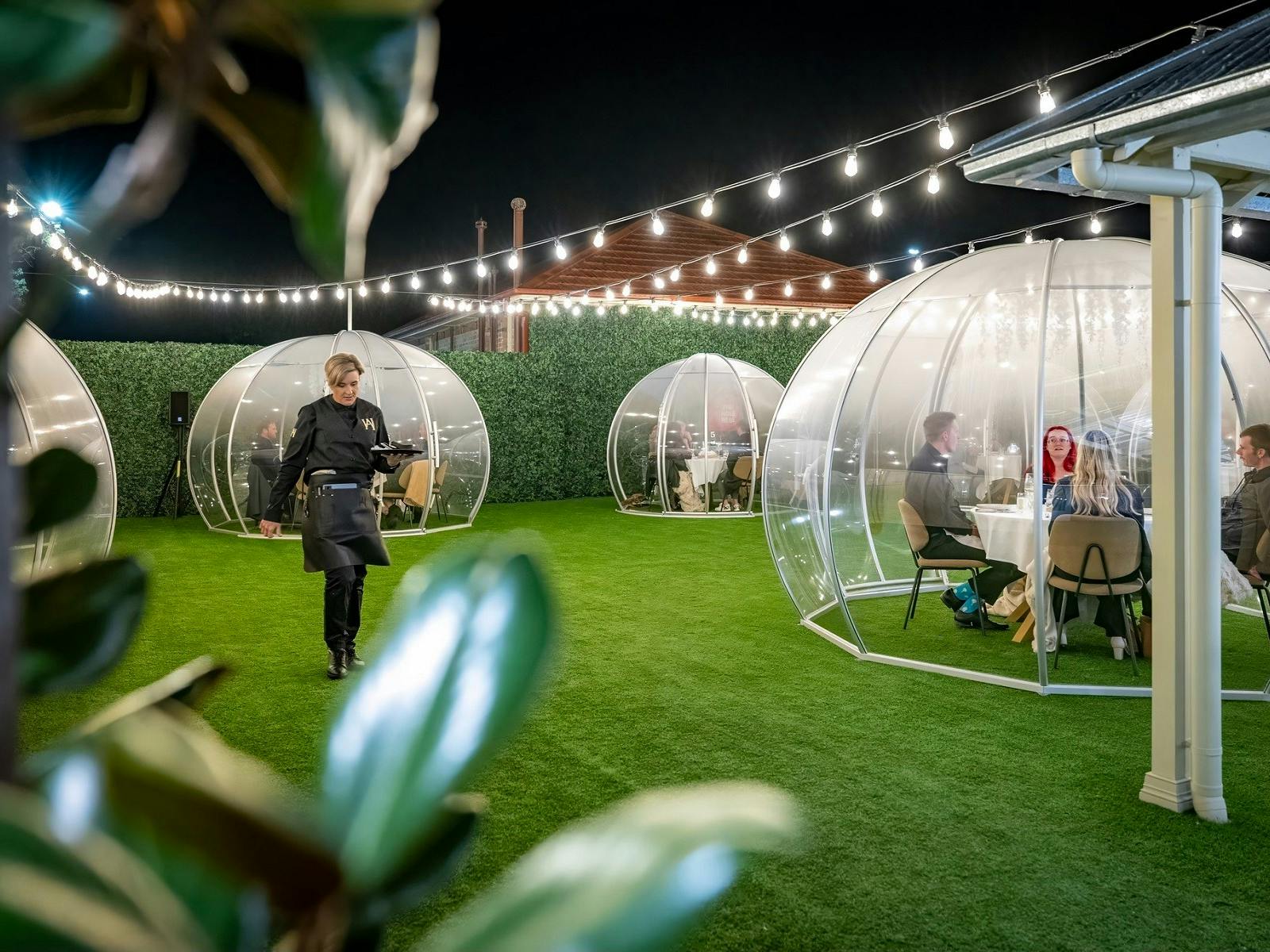 Dining in clear bubble  on a roof top