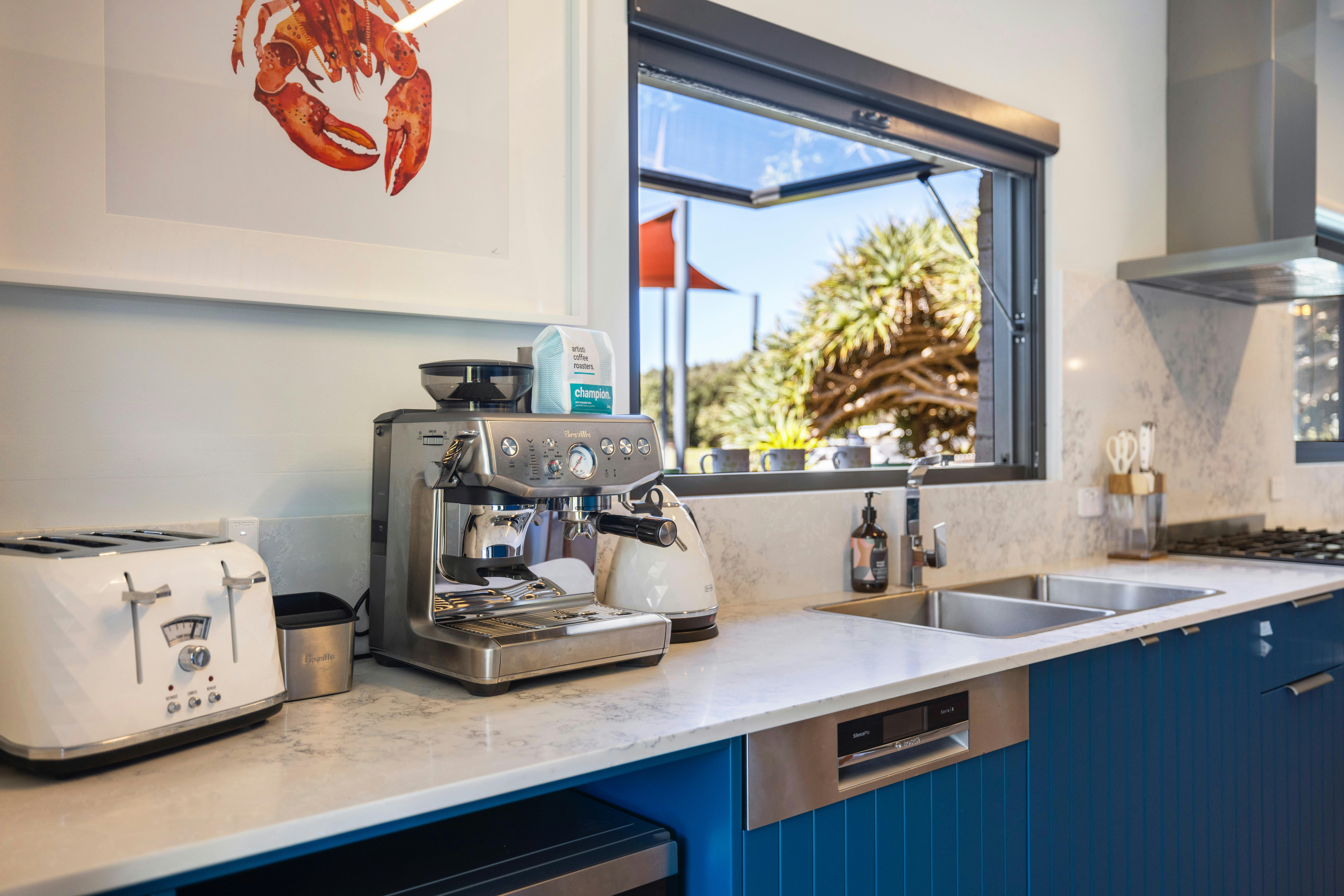 Kitchen with coffee machine