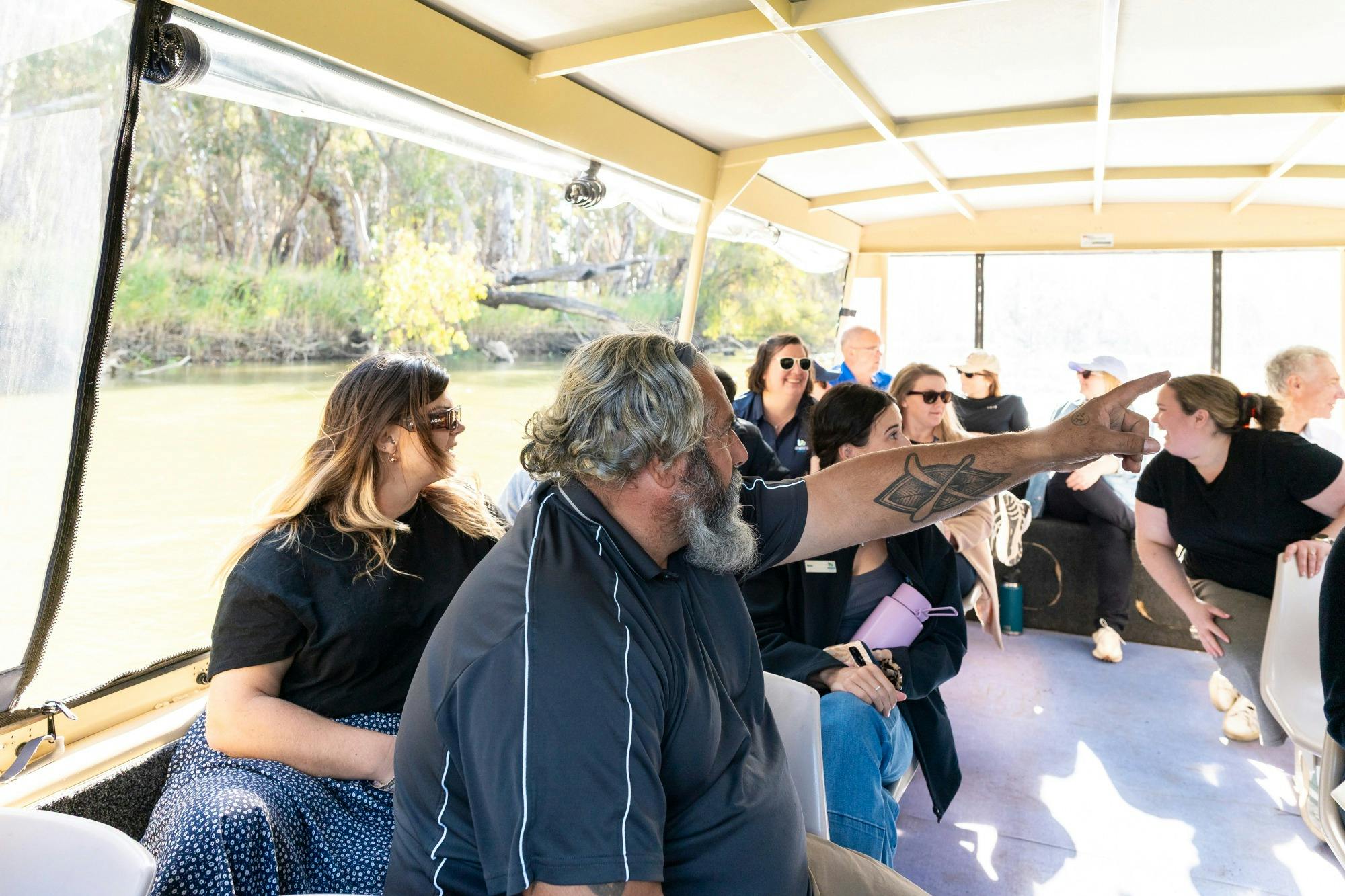 Passengers listening to cultural stories and learning about nature on the Murray.