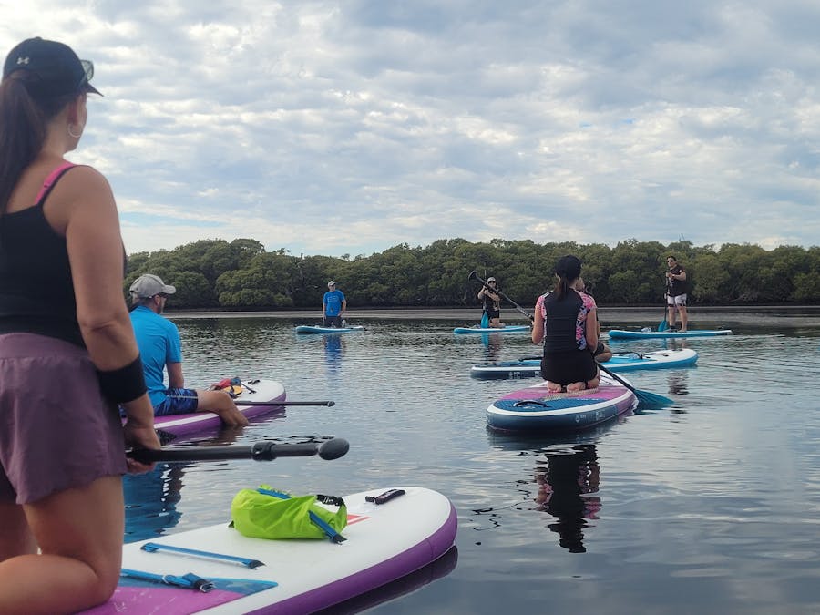 Paddlers are enjoying the calm water which flows along Minnamurra River