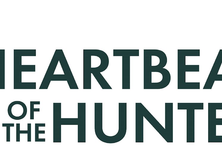 Heartbeat of the Hunter logo - guitar and words Heartbeat of the Hunter