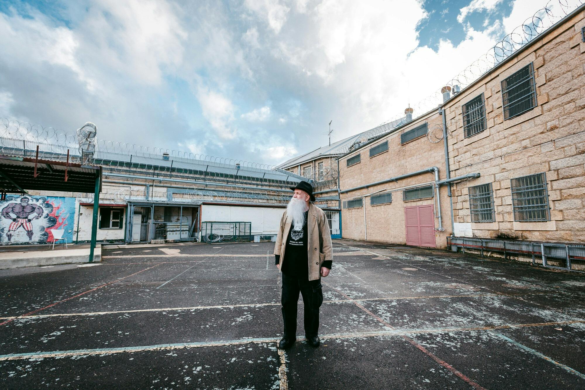 Man standing in courtyard