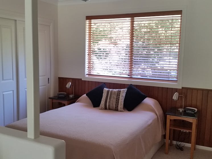 Super comfy bed in open plan spacious apartment with ensuite & spa room adjacent overlooking garden