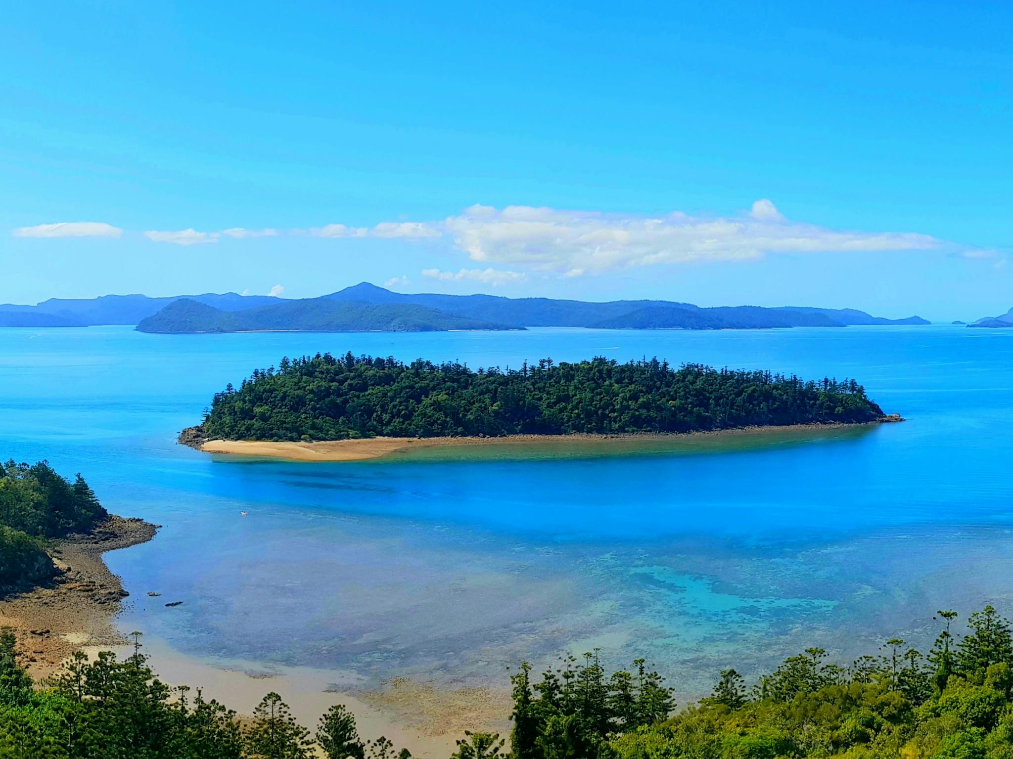 One of the many vistas while on tour on the only mountain bike trail on the Whitsunday Islands. One of the many vistas while on tour on the only mountain bike trail on the Whitsunday Islands.