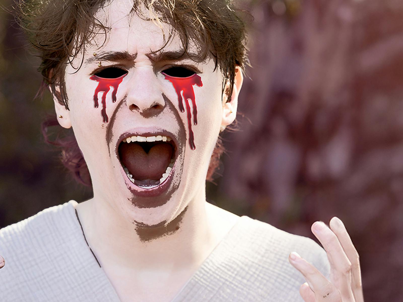 Oedipus with blood-stained eyes
