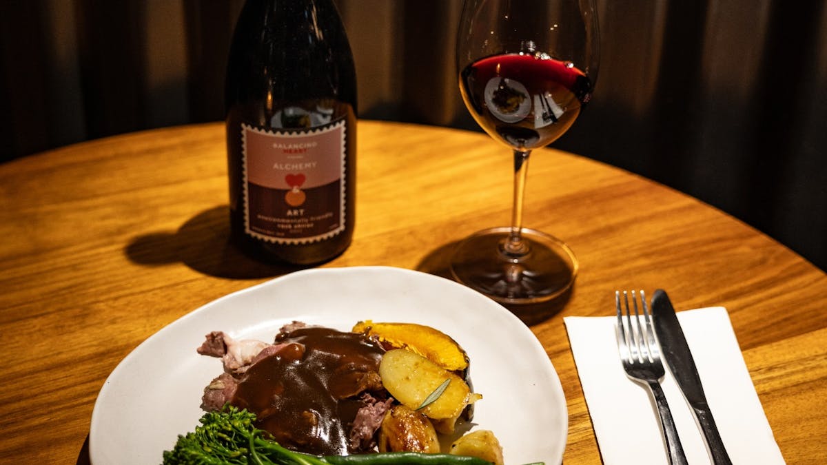 Roast meal with wine