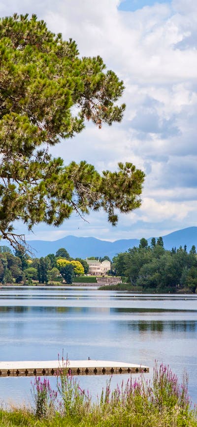 View of The Governor General's residence perched on Lake Burley Griffin