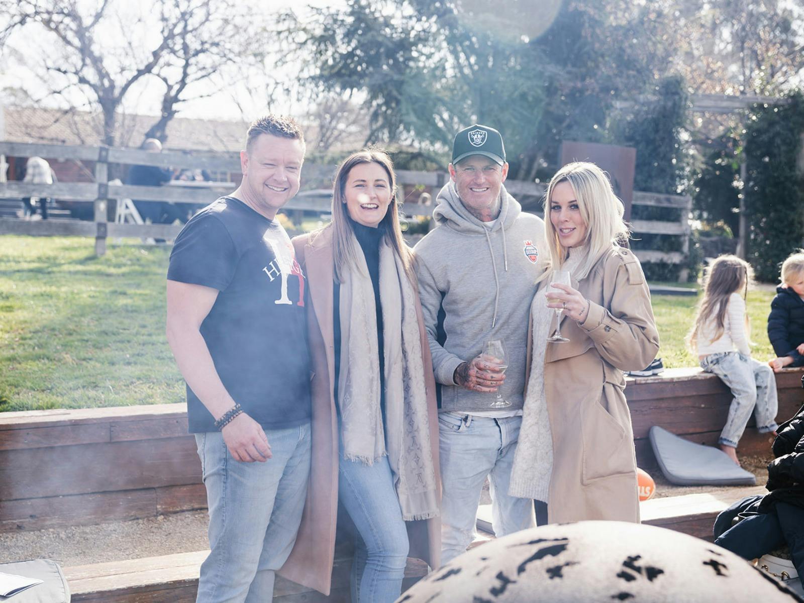 Friends enjoying wine and a bonfire at Stockmans Ridge Wines