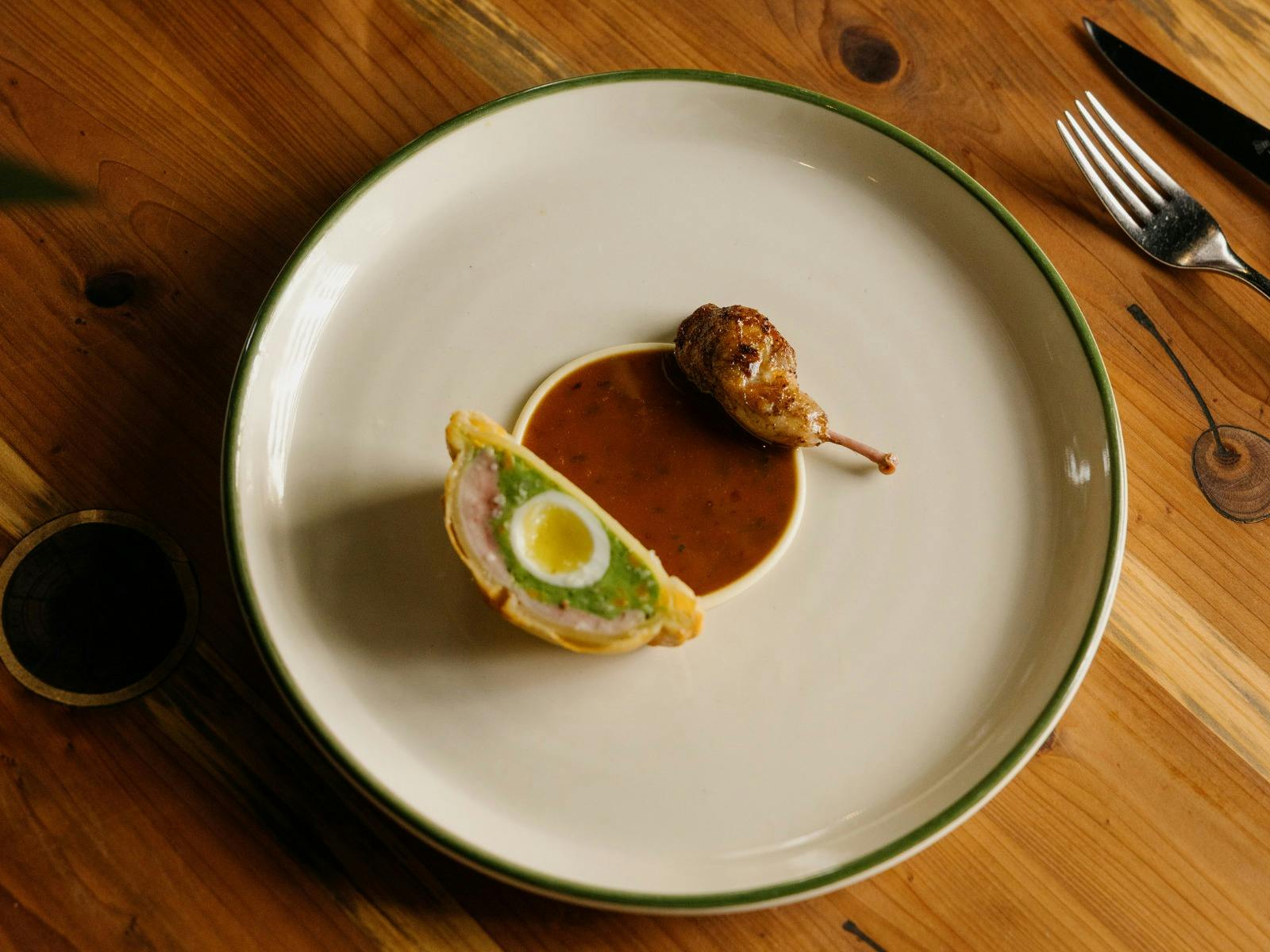 An image of a dish - quail en croute - at Fico Hobart