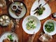 An image of food spread out on the table at Elm Dining