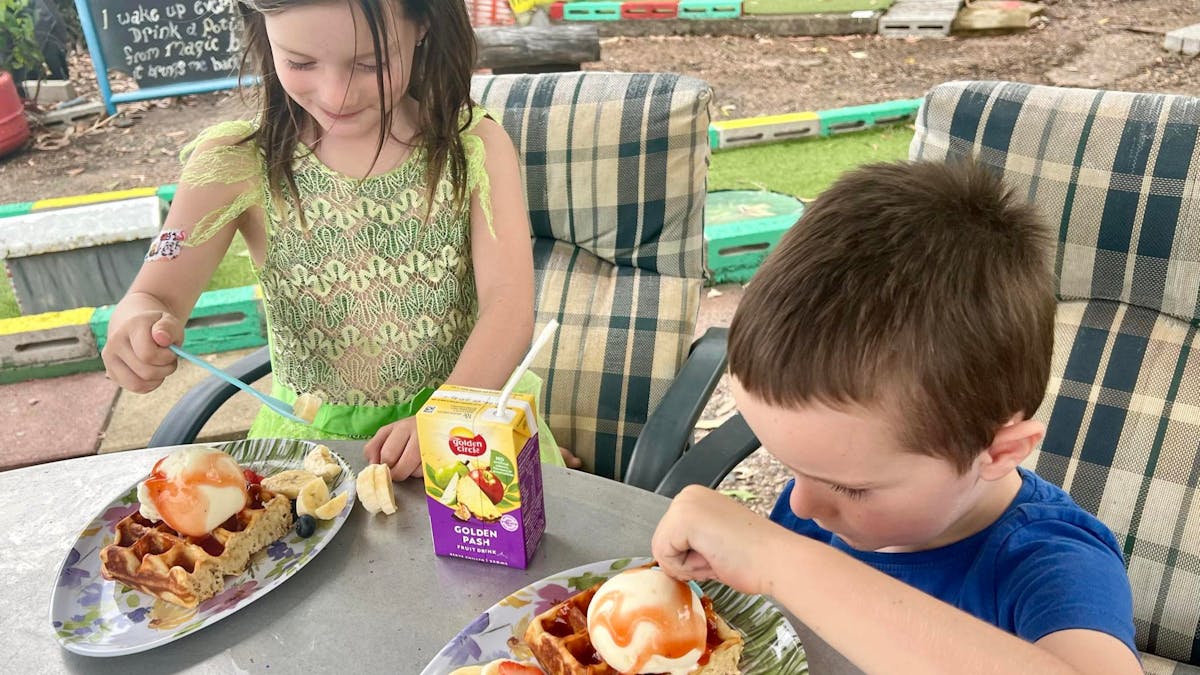 Kids eating waffles