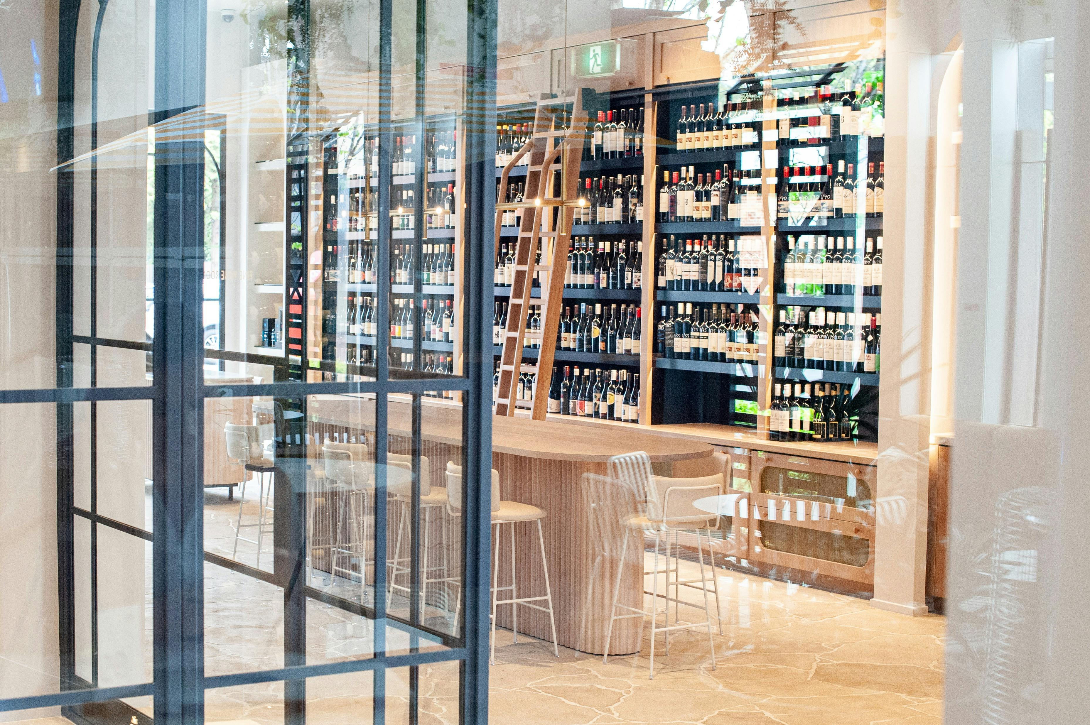 The Lion Wine Room offers a curated selection of fine wines to enjoy in a chic setting or at home.