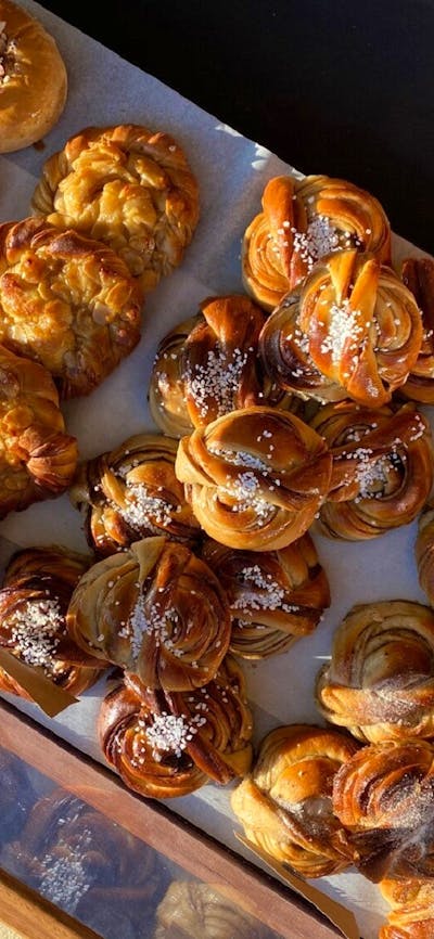 A tray of golden pastries from a birds eye view