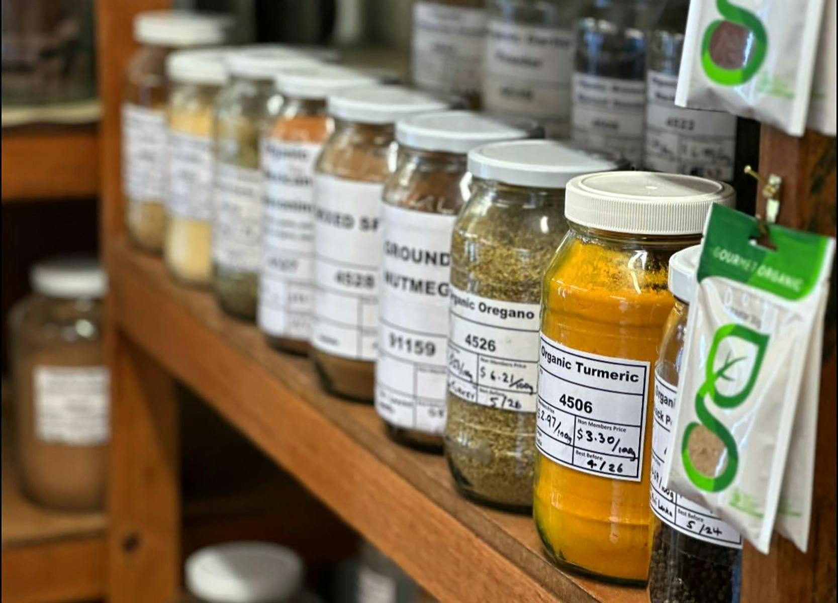 Glass Jars of organic spices at