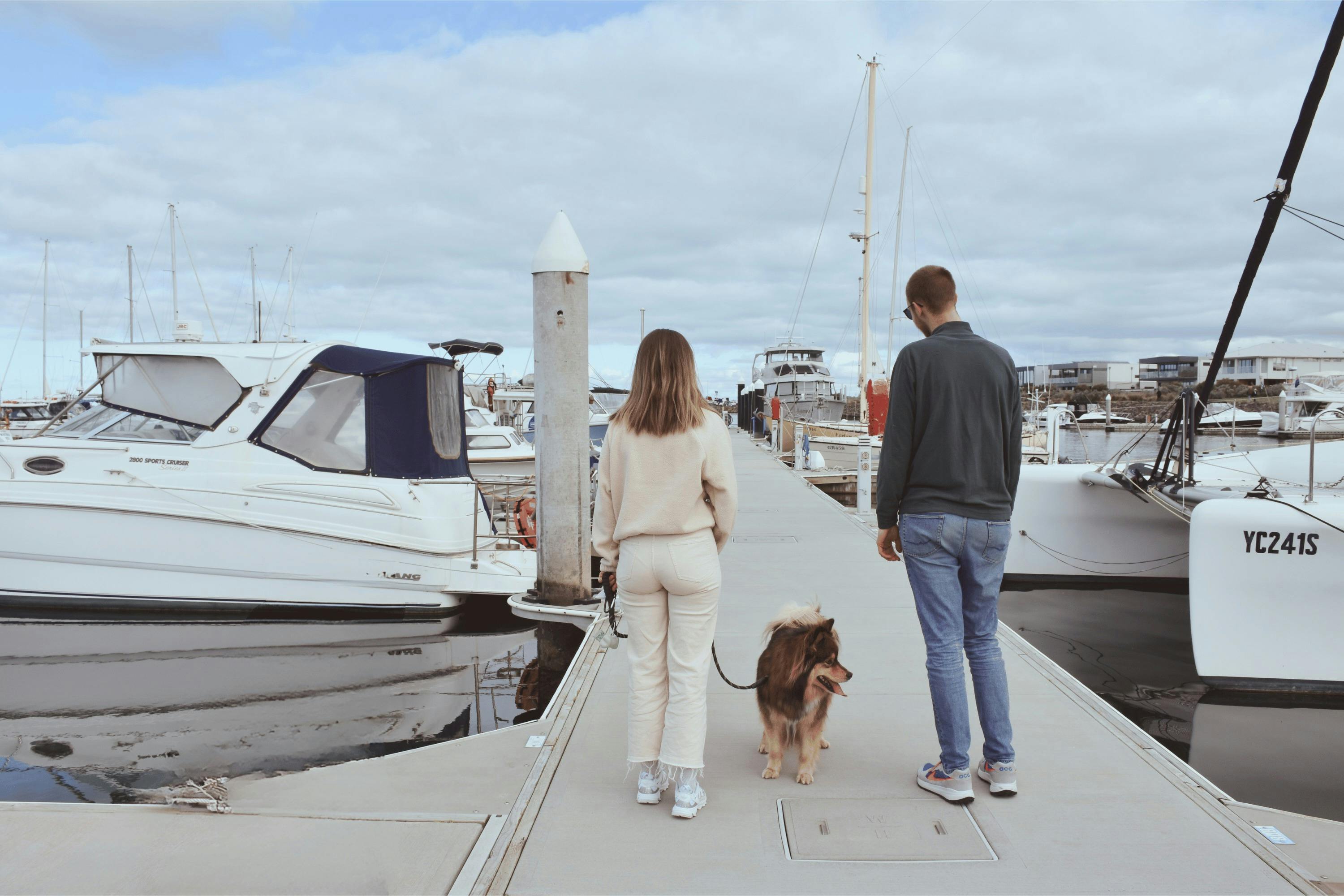 Couple with dog marina