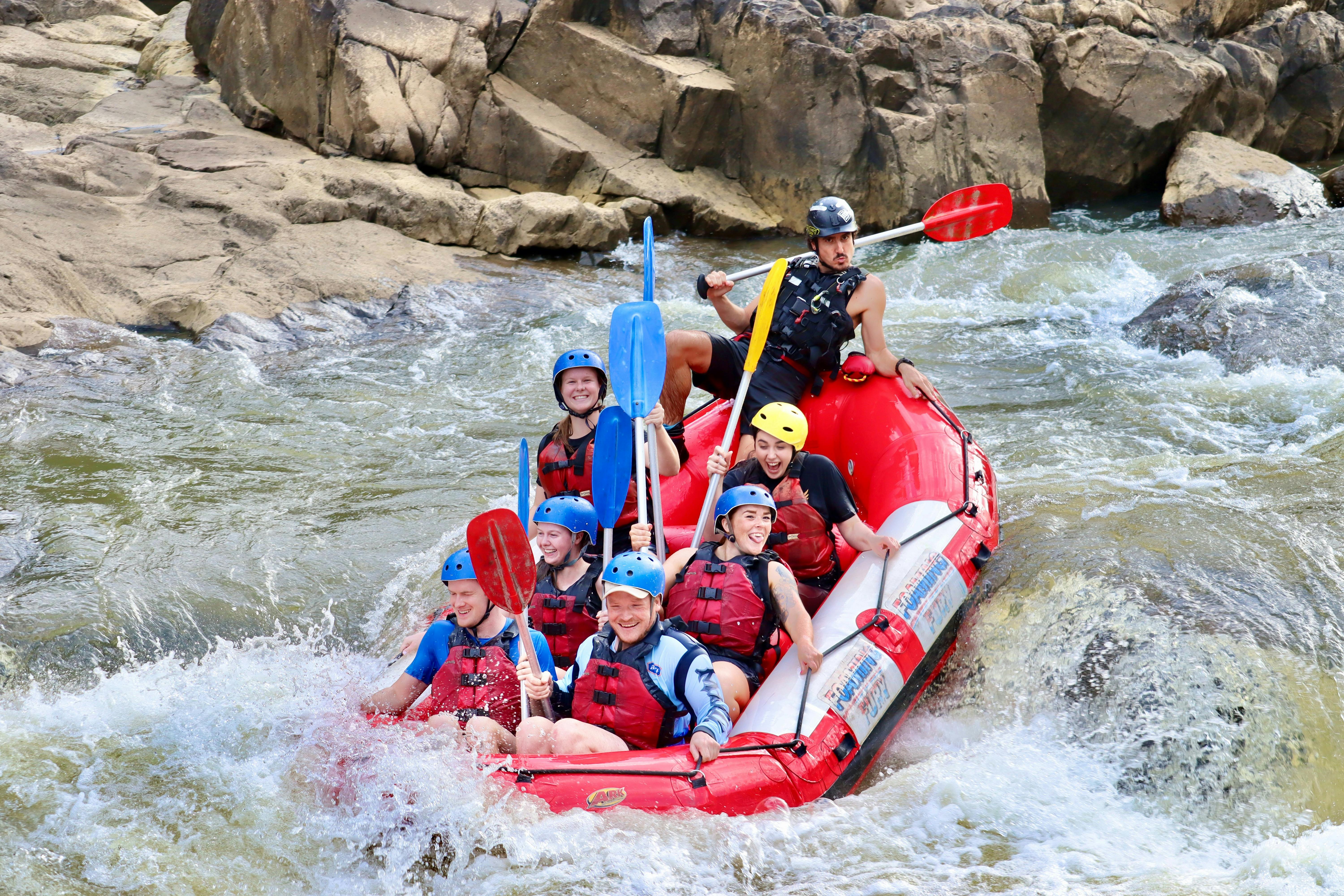 Fun Group Shot of Guests White Water Rafting on the Barron River in Tropical North Queensland