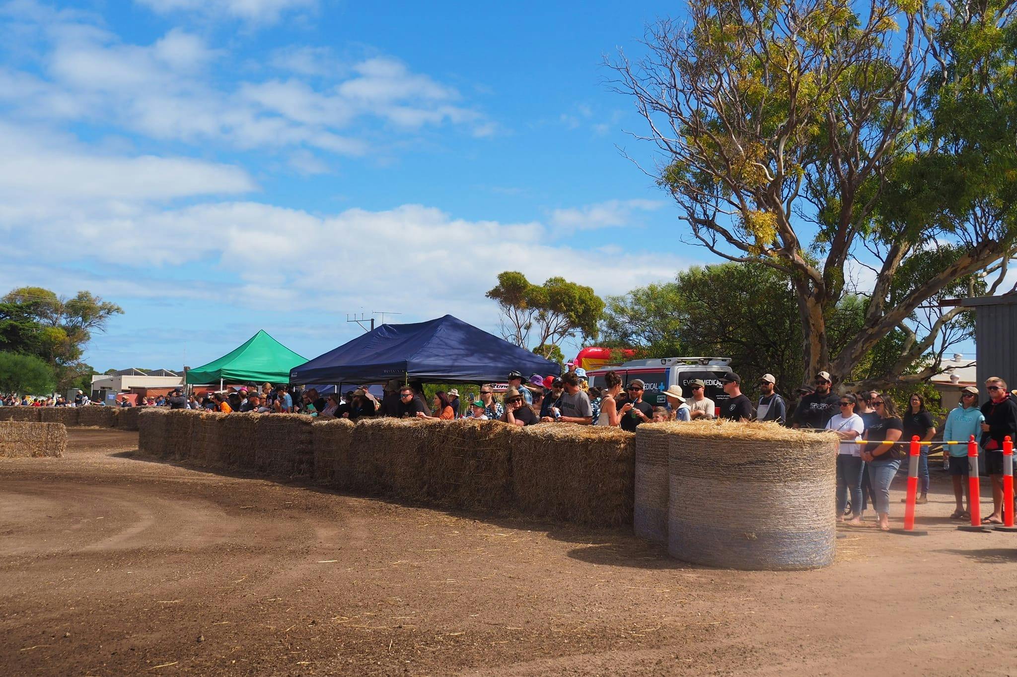 Crowd awaiting the next race of lawn mowers.