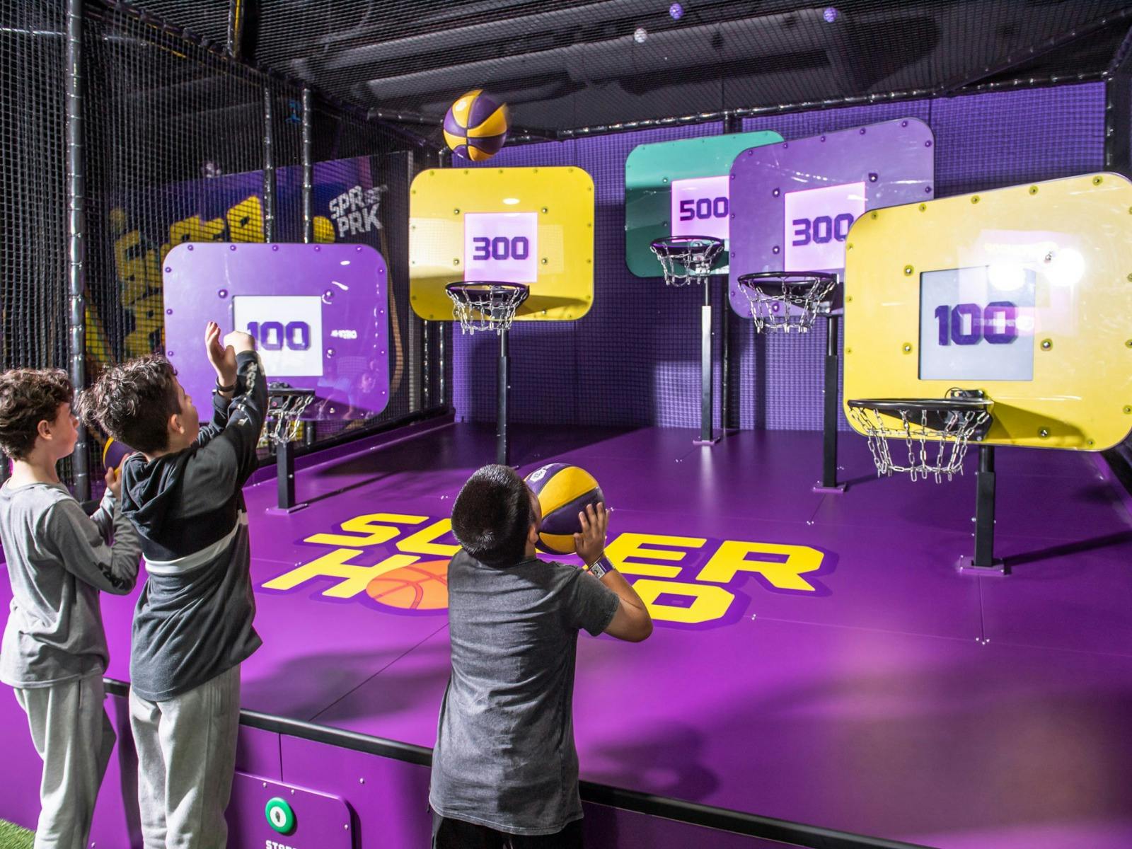 Kids Playing SuperHoop Basketball Game