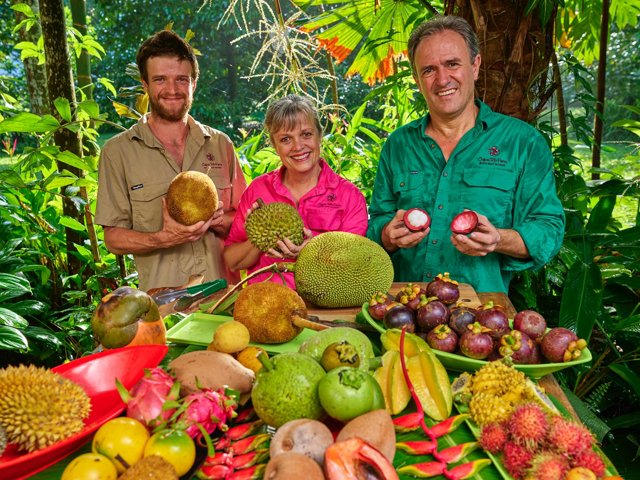 Sam, Merran & Jeremy Blockey with colourful fruit at Cape Trib Farm Sam, Merran & Jeremy Blockey with colourful fruit at Cape Trib Farm