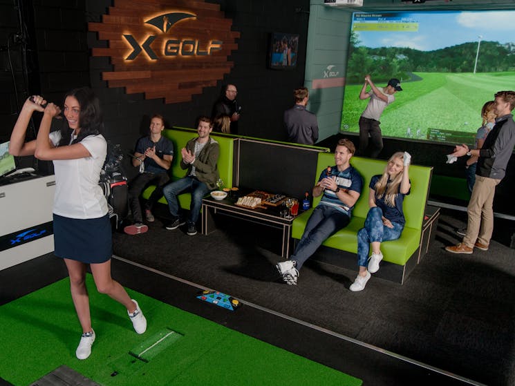 X-Golf Shire - Image of Group Enjoying Indoor Golf