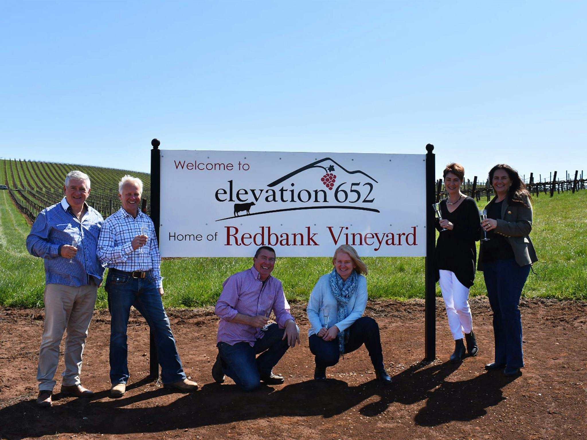 Owners at Redbank sign