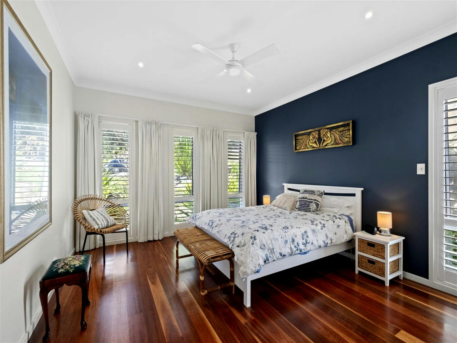 Master bedroom featuring an ensuite bathroom and walk-in wardrobe for added comfort and convenience