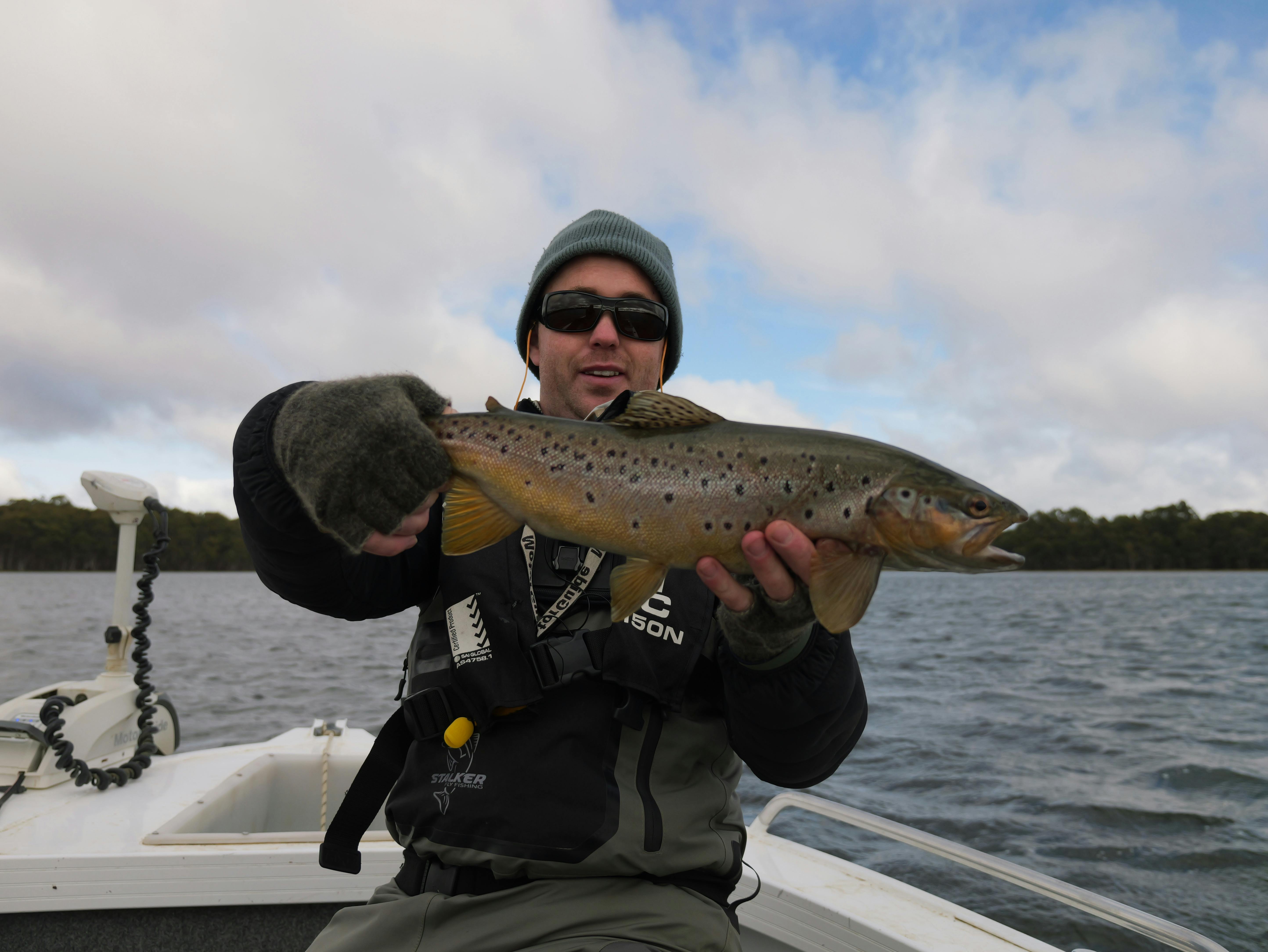 Matt holding large brown trout