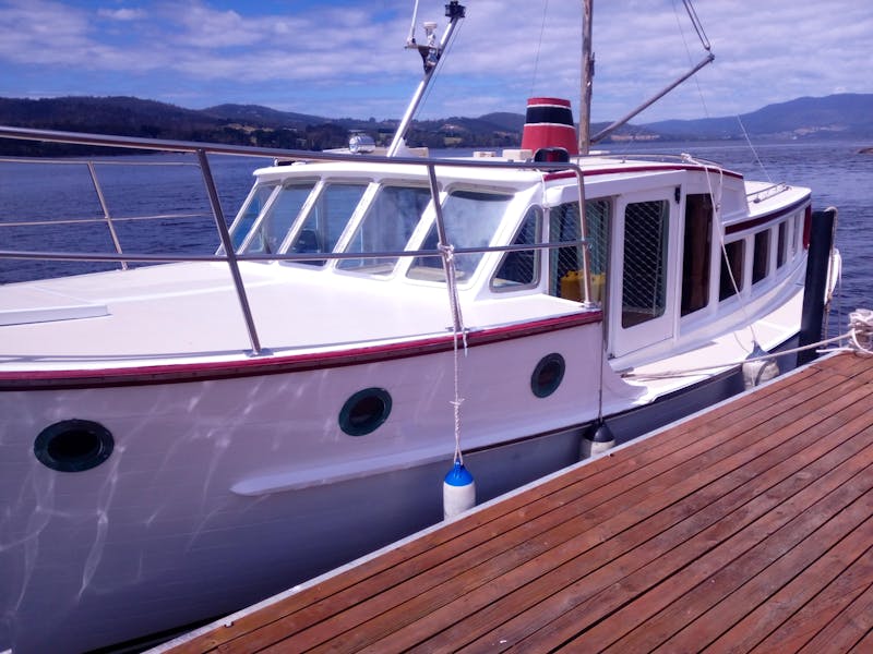 At the dock of La Drone, Huon River Cruises boat tours