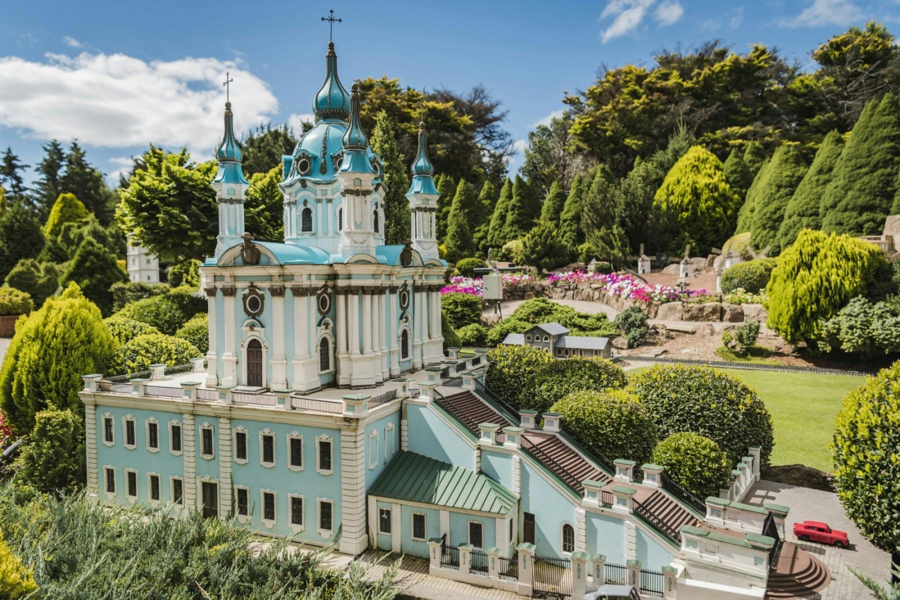 A handmade castle surrounded by well-kept garden