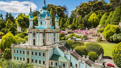 A handmade castle surrounded by well-kept garden