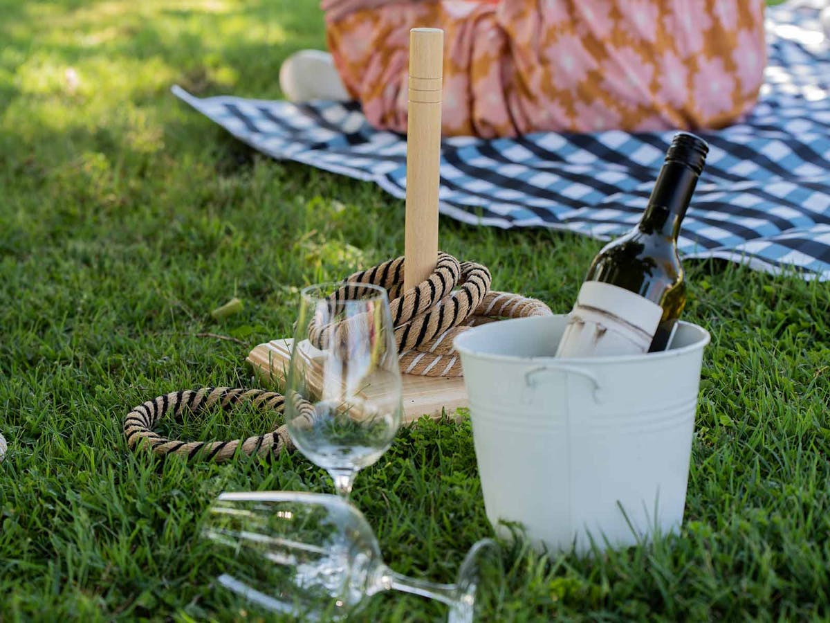 Wine chiller and glasses on the lawn