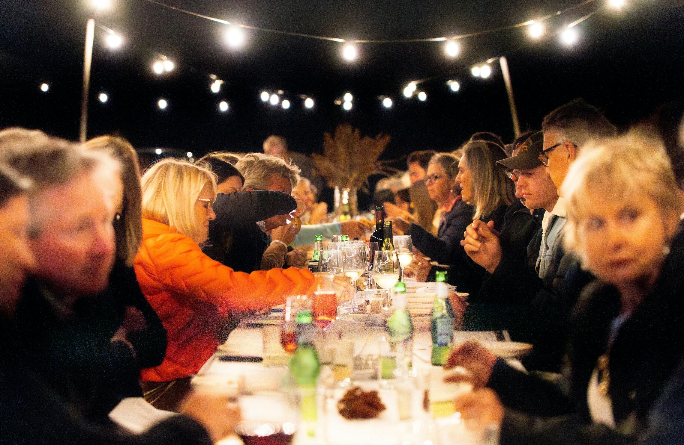 Guest dining on our communal long table dinner