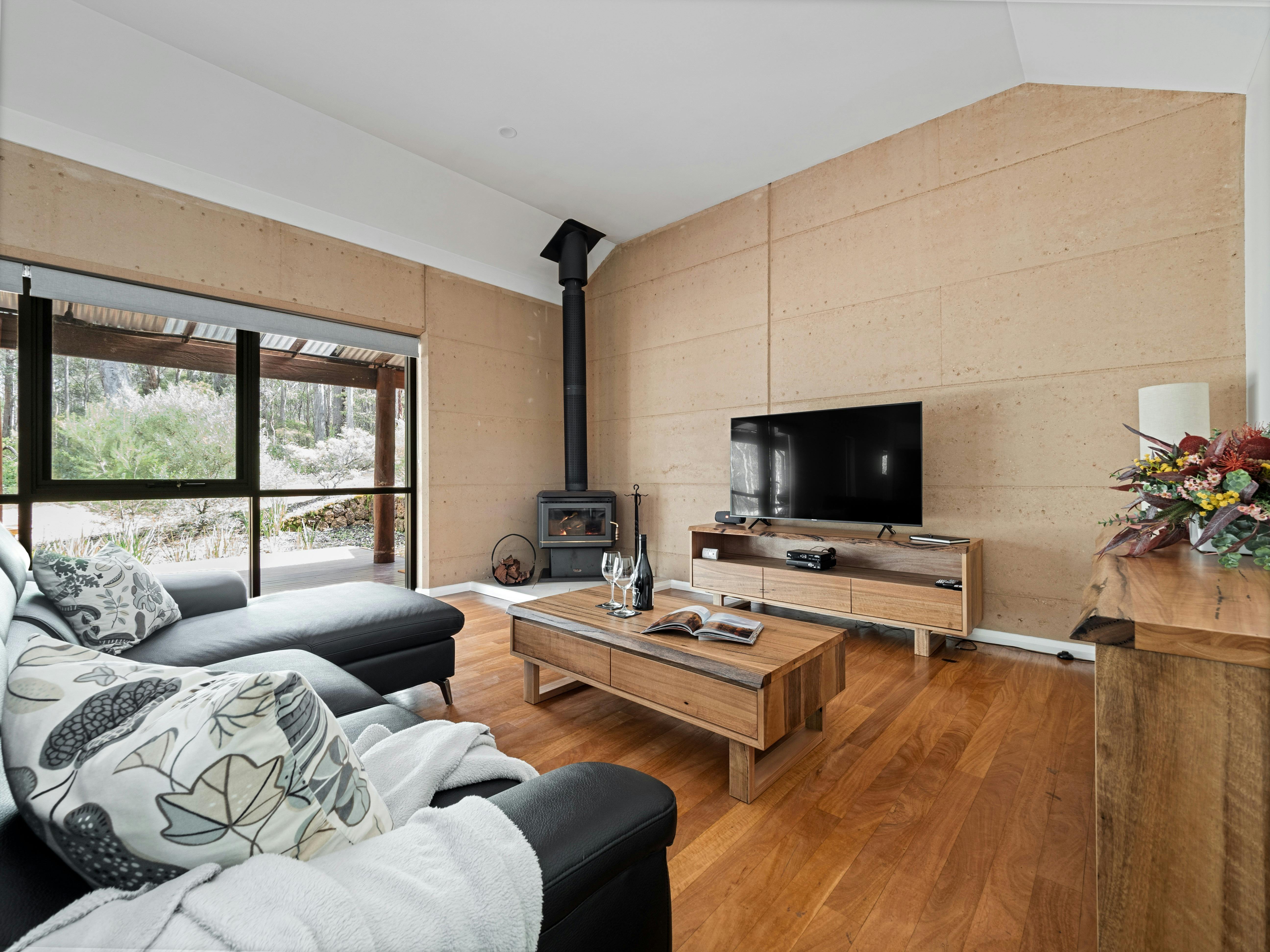 Large Living area with beautiful Marri Furniture, Log Fire, Smart TV