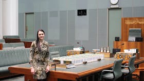General Manager Summer Koker with the Central Table made by Constantia