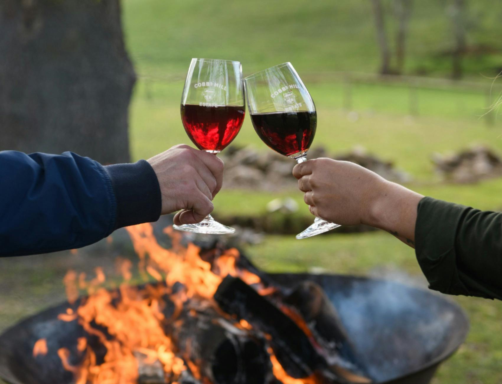 Wines by outdoor firepits - Cobb's Hill Estate