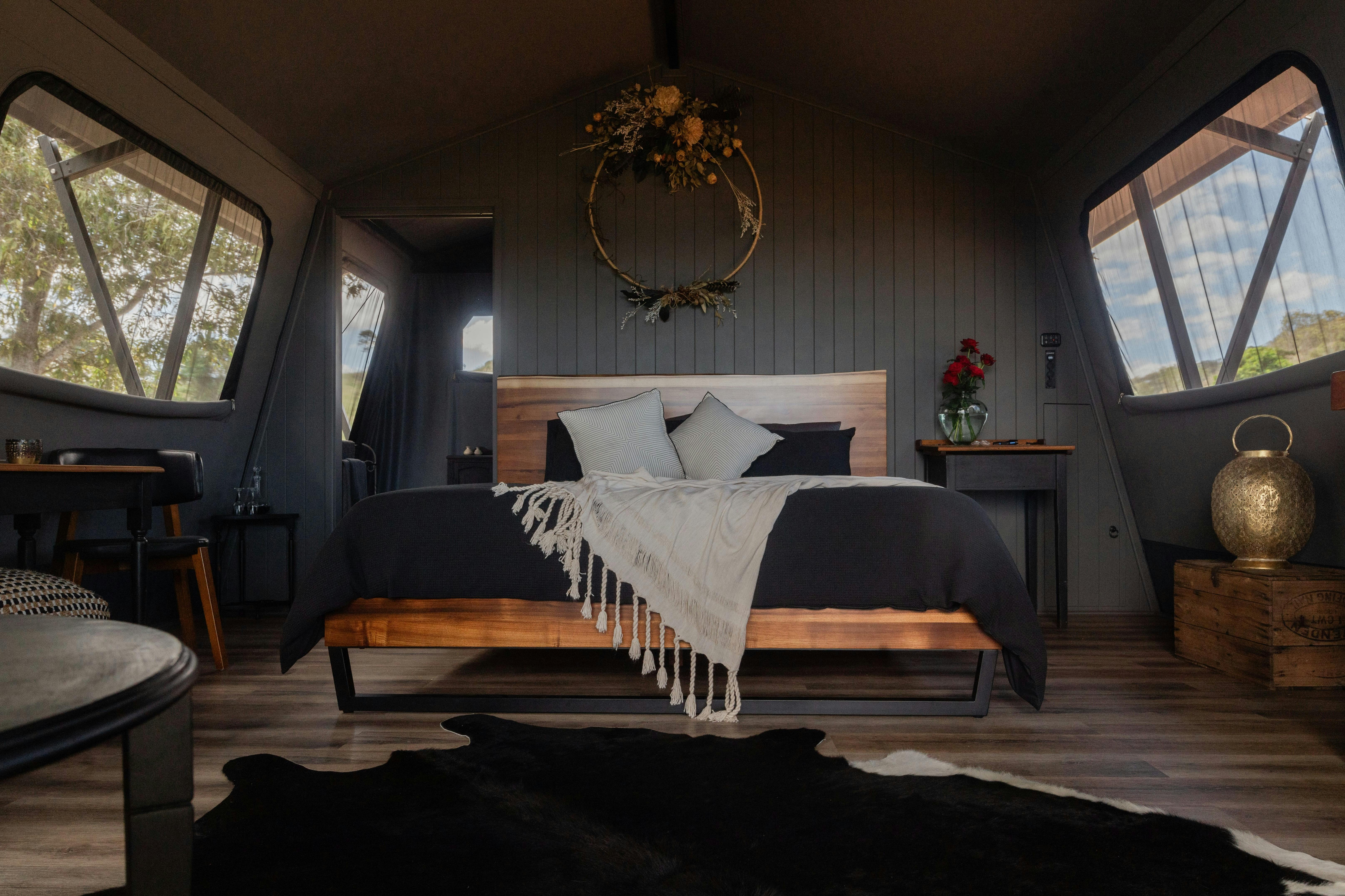 Luxury glamping at its best. Enjoy the stunning view from the comfort of your own king size bed.
