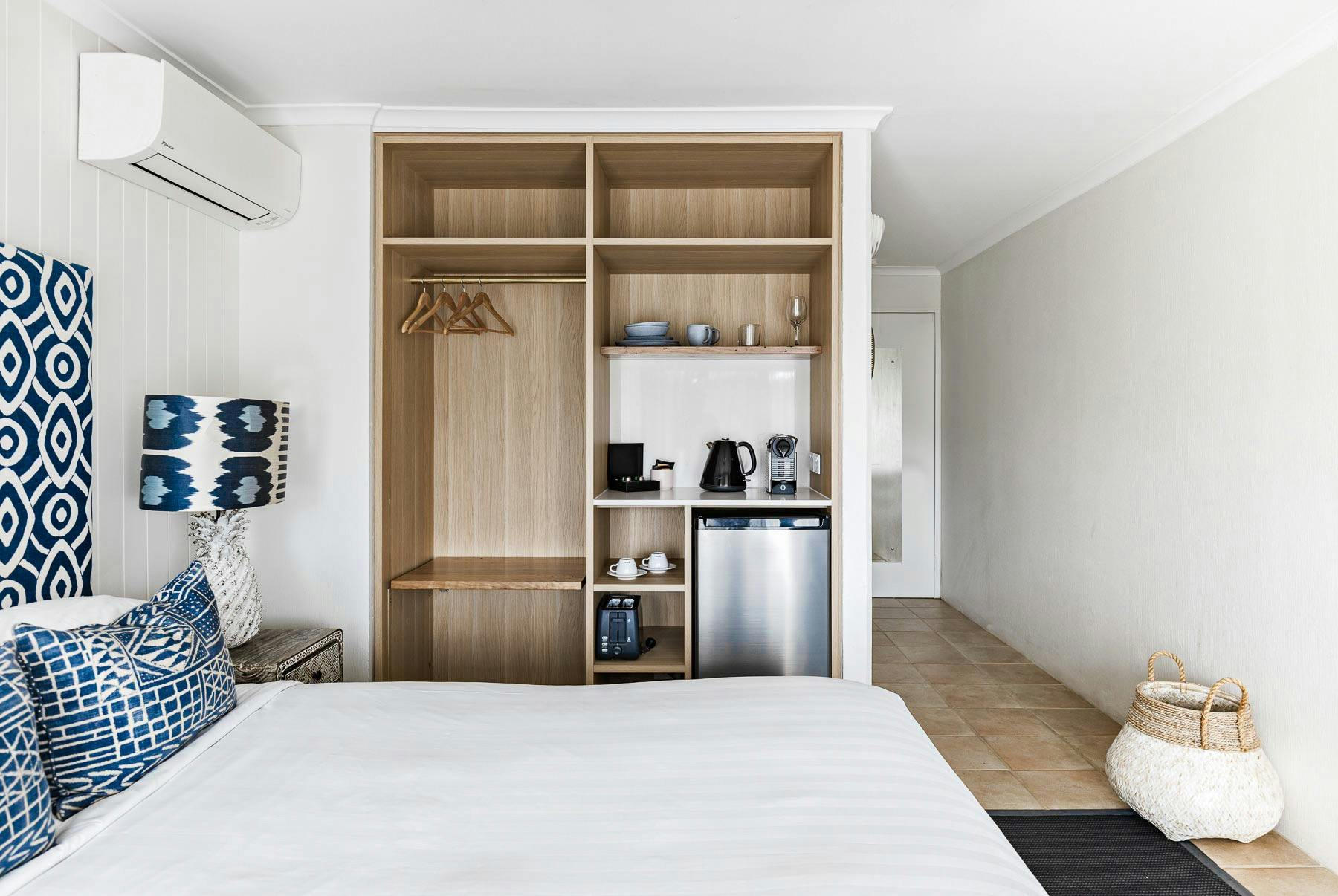Rooms at The Lord Byron Hotel include a small kitchenette with mini-fridge, kettle, toaster, coffee