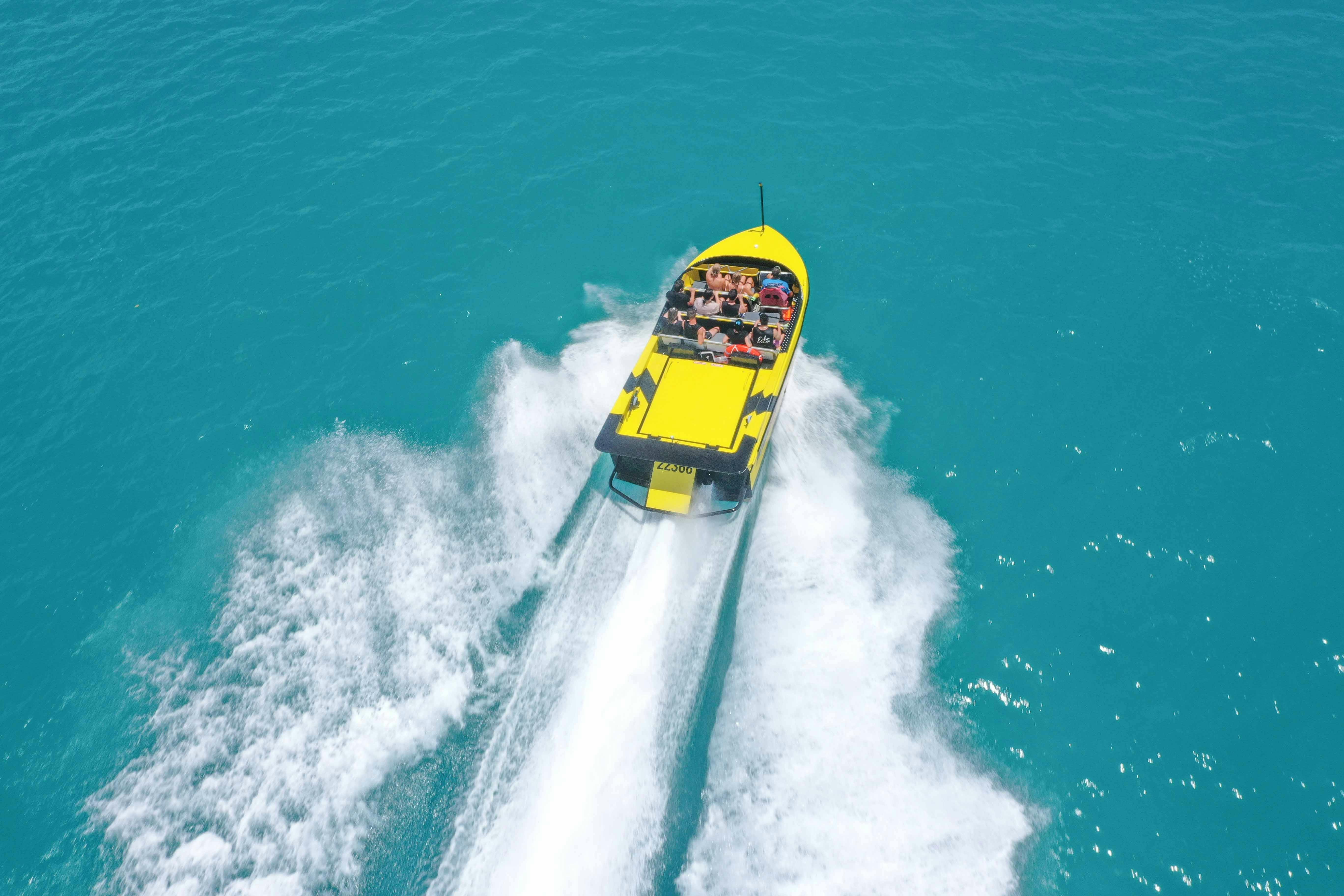 aerial image of jet boat moving at speed